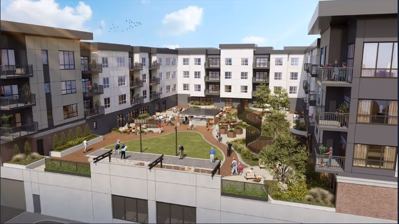 Outdoor courtyard area of Bellara Senior Living facility with multiple people walking and sitting on benches. The courtyard features green lawn, trees, plants, and paved walking paths surrounded by a multi-story residential building with balconies.