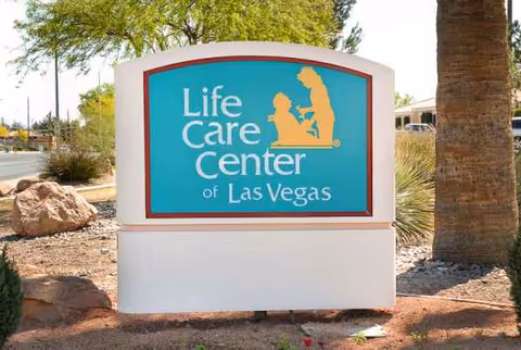 Exterior view of the Life Care Center of Las Vegas entrance sign.