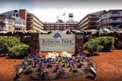 Exterior view of Judson Park with a front sign and landscaped entry.