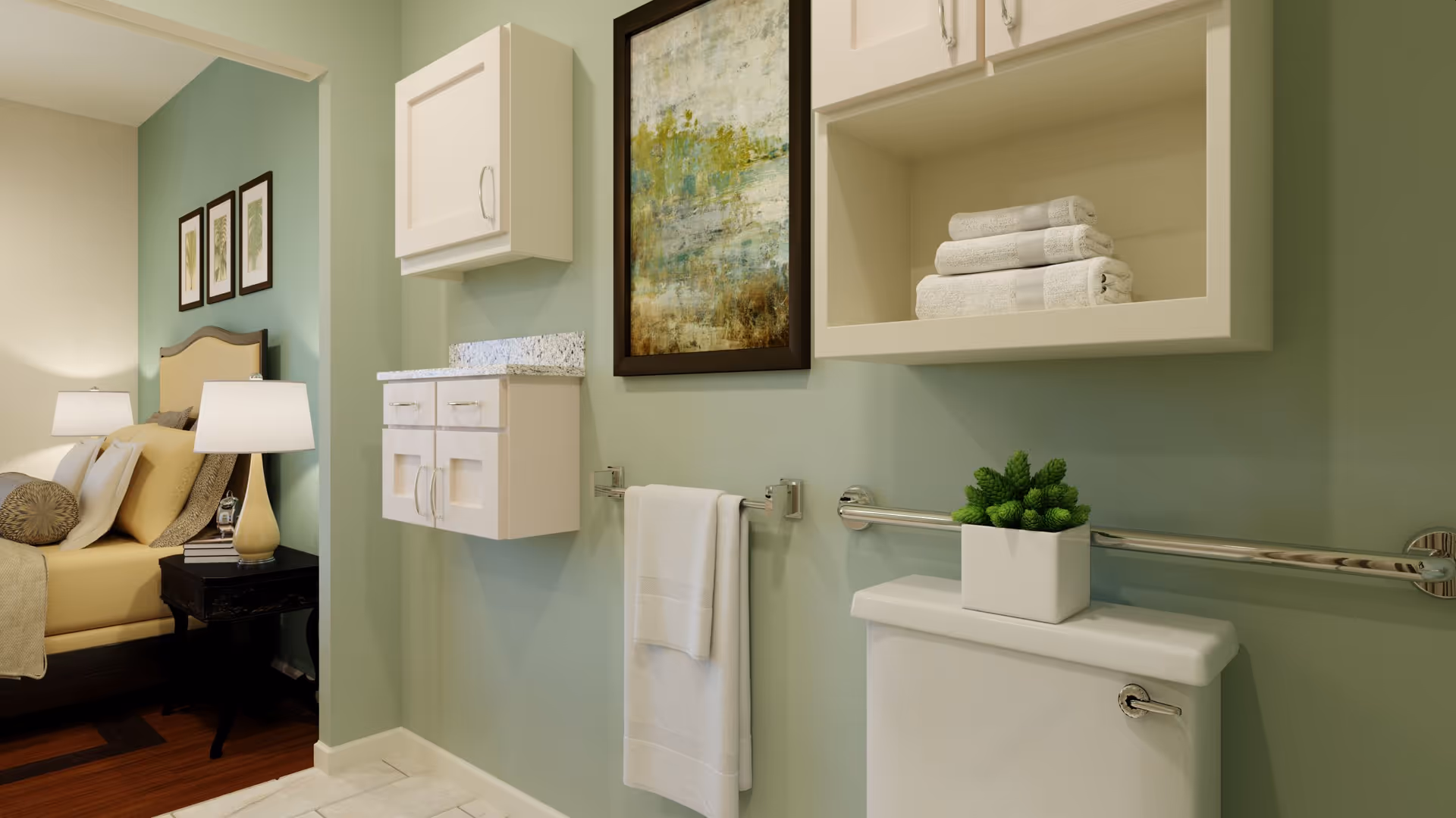 A bathroom with light green walls featuring a white toilet with a small green plant on top, a towel rack with a white towel, and white cabinets mounted on the wall. Adjacent to the bathroom is a bedroom with a bed, pillows, a nightstand, and a lamp.