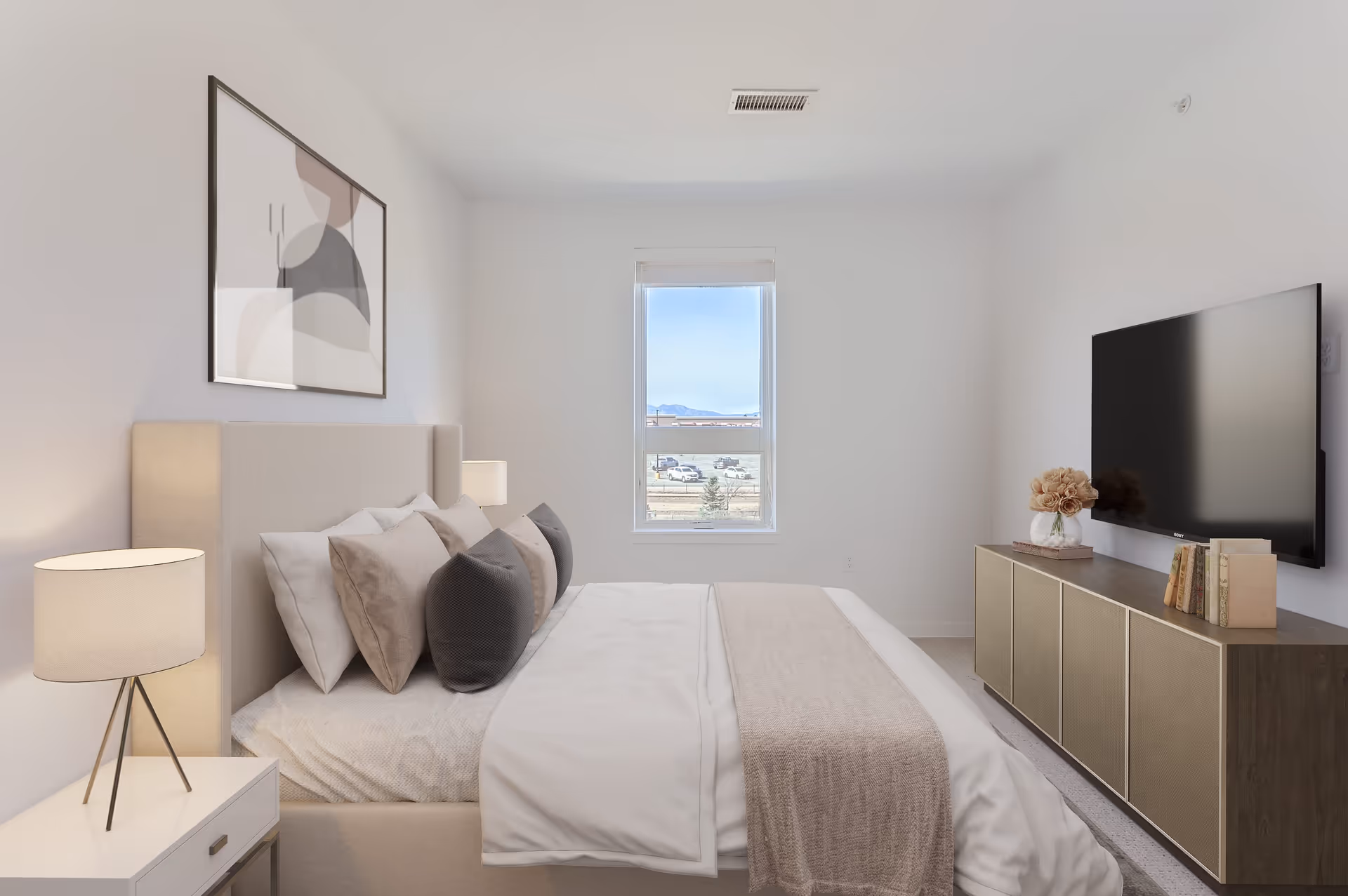 Bright minimalist bedroom with a neatly made bed, bedside lamps, a window at the far wall, and a wall-mounted TV above a low console.