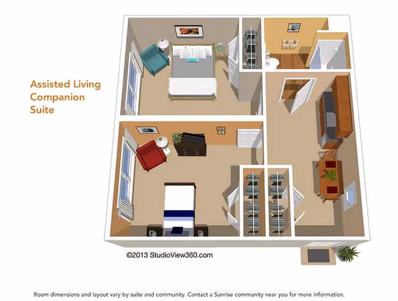 3D floor plan of an assisted living companion suite showing two bedrooms, a bathroom, a kitchen area, and a dining space. Each bedroom has a bed, chair, and dresser. The bathroom includes a shower and sink. The kitchen has cabinets and a dining table with chairs.