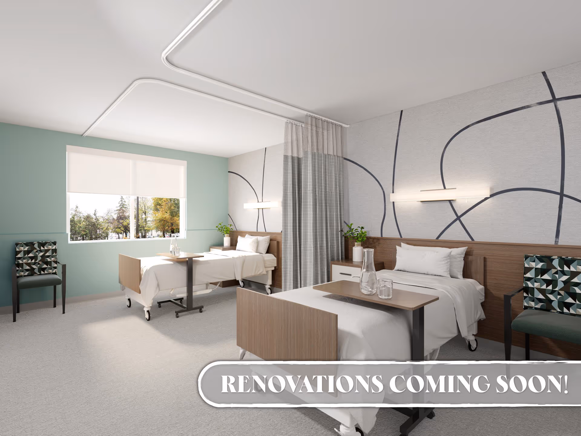 A bright, modern shared patient bedroom with two hospital beds, bedside tables, chairs, a privacy curtain, and a window.