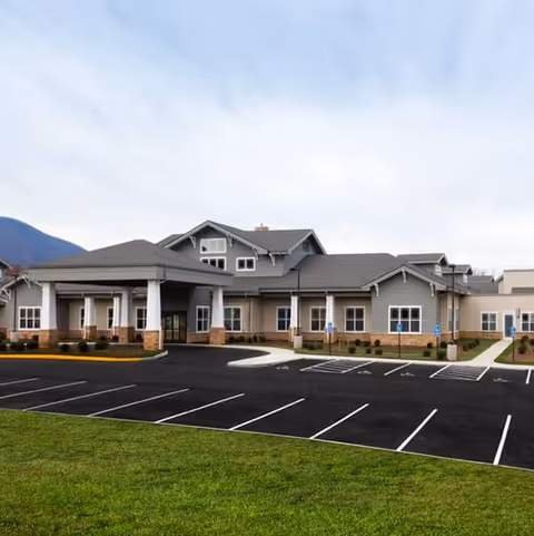 Exterior view of Friendship Health & Rehab Center North with a covered entrance and parking lot.