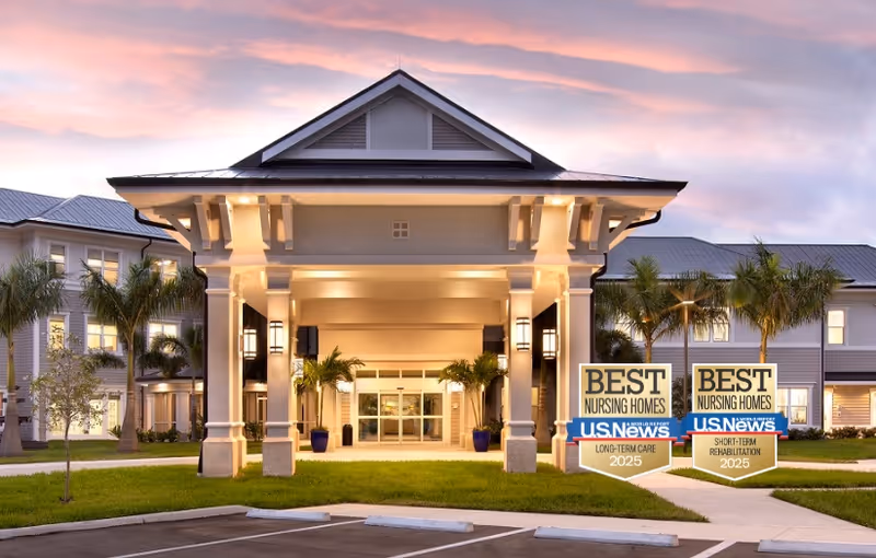 Front exterior view of Horizons Care Center at sunset with a covered entrance, palm trees, and two signs displaying awards for Best Nursing Homes by U.S. News for Long-Term Care and Short-Term Rehabilitation in 2025.
