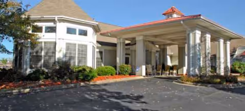 Brookdale Anderson senior living facility exterior with a covered entrance and landscaping.