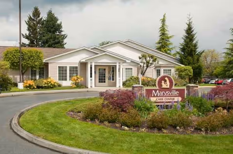 Exterior view of Marysville Post-Acute facility with landscaped entrance and circular driveway.