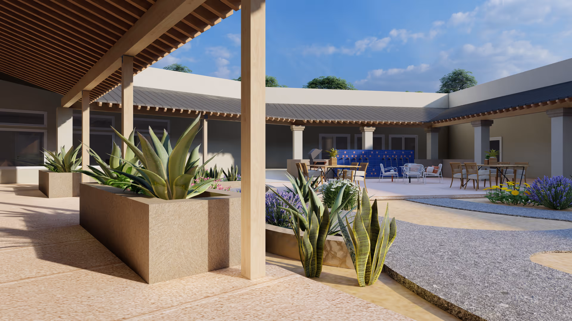 Outdoor courtyard area with a covered walkway supported by wooden beams, large planters with green plants, seating areas with tables and chairs, and a clear blue sky above.