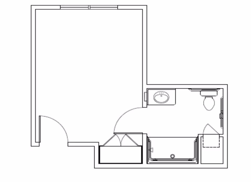 Architectural floor plan showing a layout with a bathroom that includes a sink, toilet, and shower, adjacent to an empty room with a door and closet space.