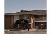 Exterior view of Watercrest at Cherry Creek entrance with a canopy sign.