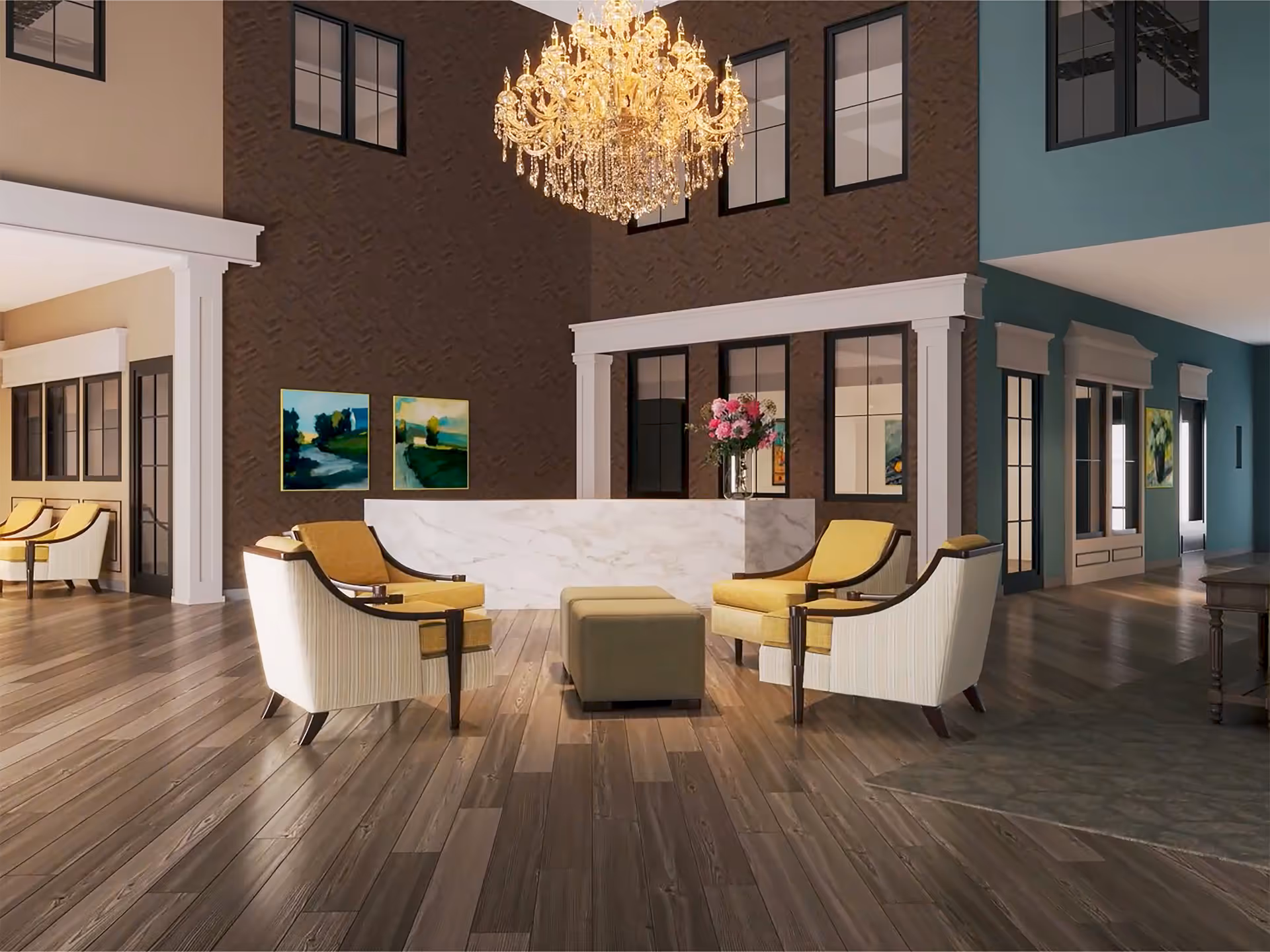 Spacious elegant lobby with a crystal chandelier, marble reception desk, yellow upholstered chairs and hardwood floors.