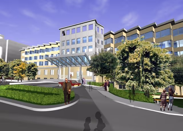 Exterior view of a multi-story senior living facility with a covered entrance, surrounded by trees and greenery. Several people are walking or standing near the entrance and along the pathways.