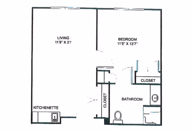Floor plan of a senior living unit at Parkwood Village And The Landing showing a living room measuring 11 feet 9 inches by 21 feet, a bedroom measuring 11 feet 9 inches by 13 feet 7 inches, a bathroom with a toilet and sink, two closets, and a kitchenette area.