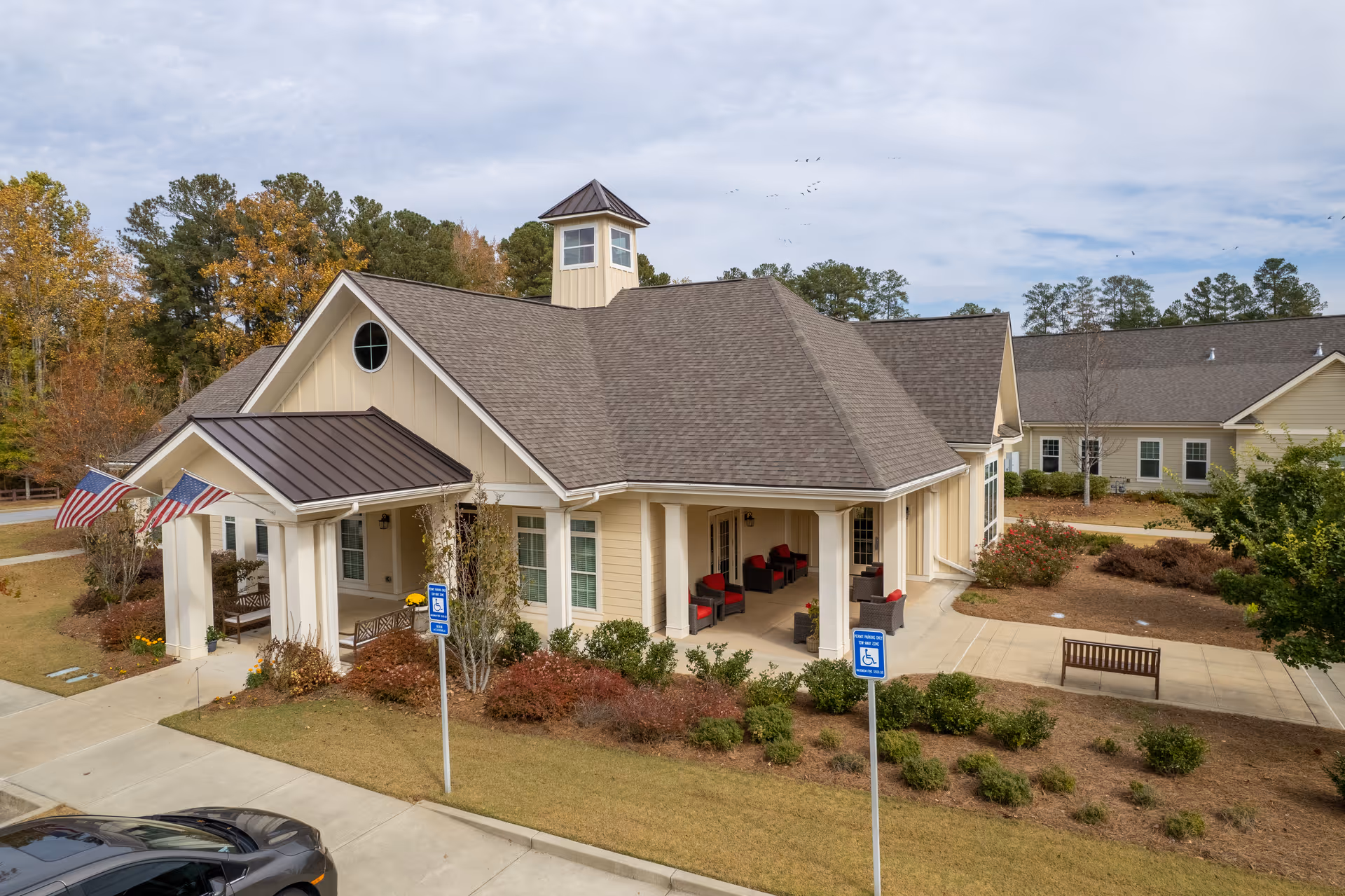 Exterior view of Camellia Place senior living facility with welcoming porch.