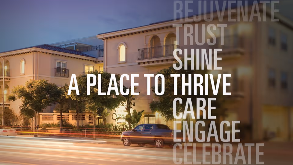 Exterior view of Belmont Village Senior Living Encino building at dusk with trees and parked cars in front, overlaid with motivational words like 'A Place to Thrive', 'Rejuvenate', 'Trust', 'Shine', 'Care', 'Engage', and 'Celebrate'.