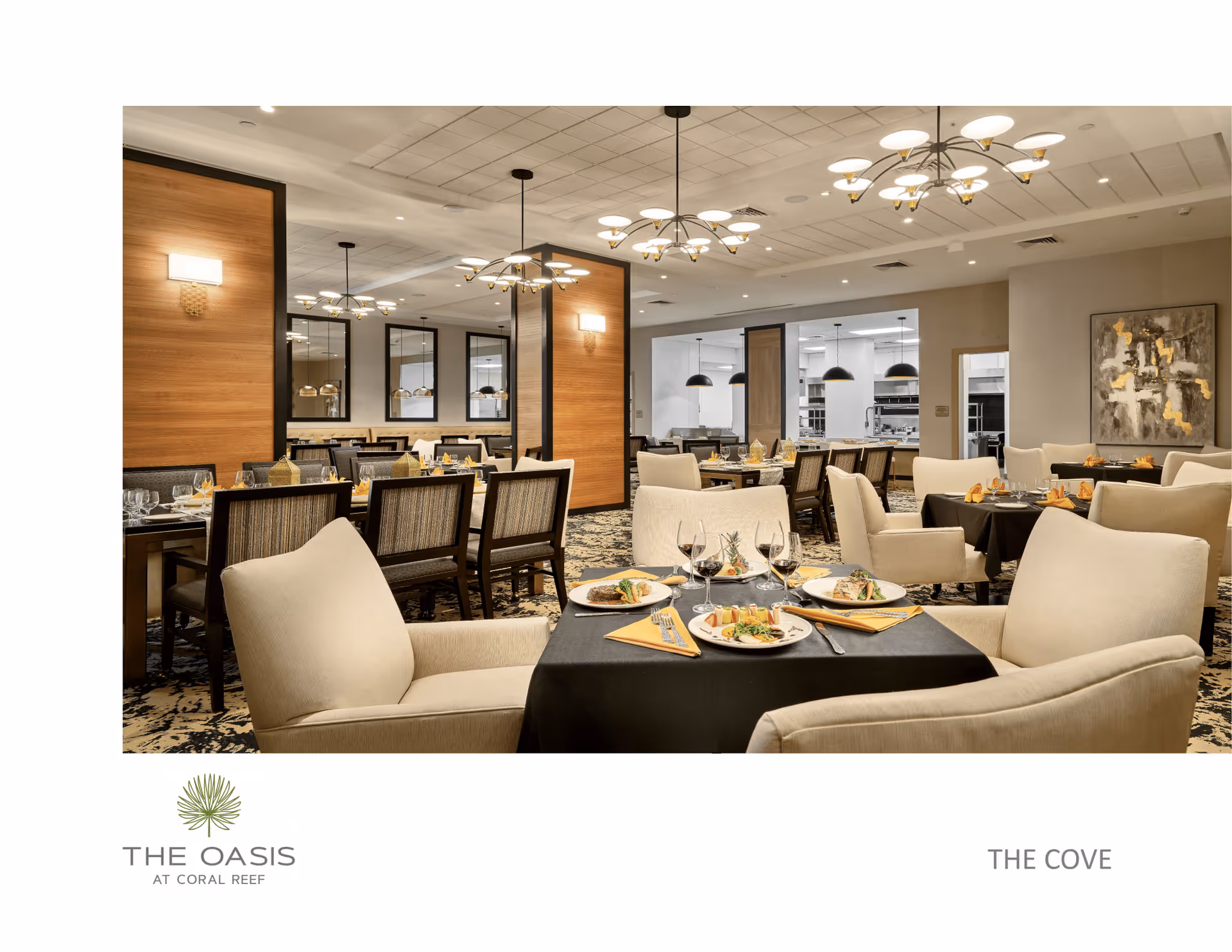 Well-appointed dining room with tables set for a meal, upholstered chairs, and modern chandeliers.