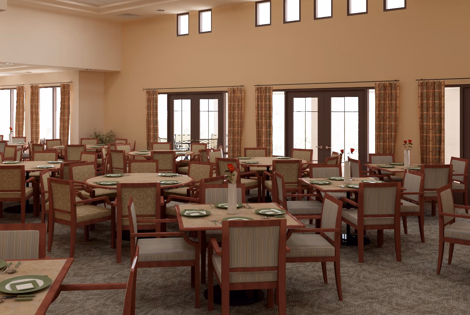 Spacious dining room with multiple round tables and chairs set with plates and vases in a senior living facility.