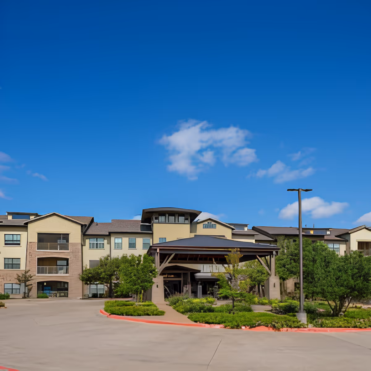 Exterior view of Discovery Village At Twin Creeks senior living facility.