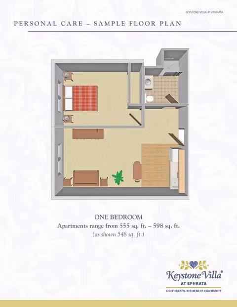 A sample floor plan for a one-bedroom personal care apartment at Keystone Villa at Ephrata. The layout includes a bedroom with a bed and two nightstands, a bathroom with a toilet and shower, a living area with a sofa and table, and a kitchen area with appliances and a dining table. The apartment size ranges from 555 to 598 square feet, with the shown layout being 548 square feet.