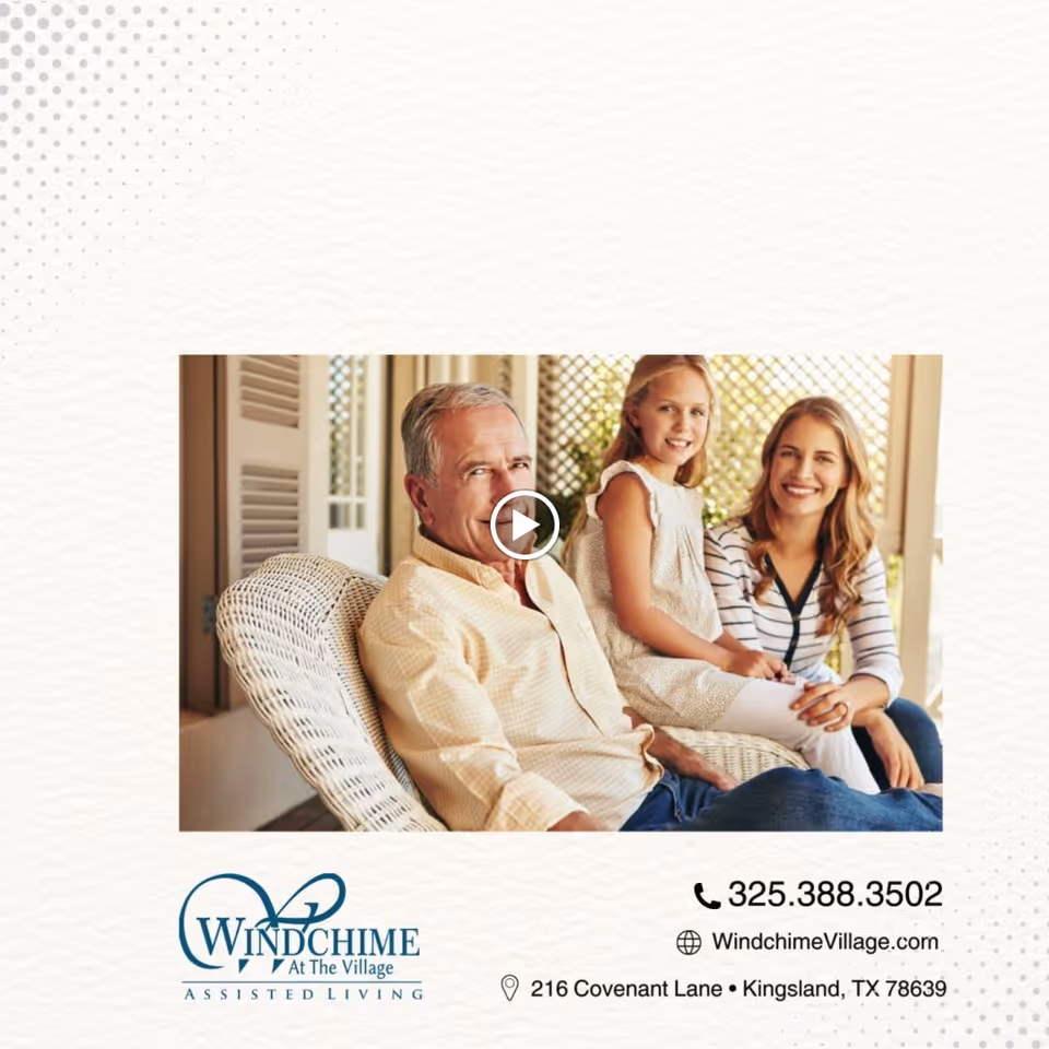 An older man, a young girl, and a woman sitting together on a white wicker bench on a porch or patio, smiling and enjoying each other's company.