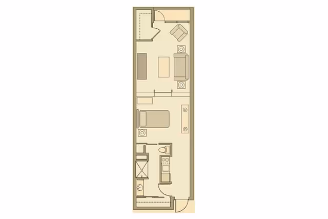Floor plan of a senior living apartment at Garden Plaza at Inverrary showing an entryway leading to a kitchen, bathroom, bedroom, and living room area with furniture layout.