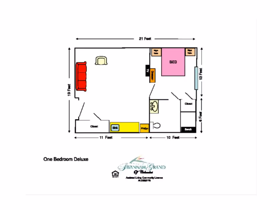 Floor plan layout of a one-bedroom deluxe apartment showing dimensions and furniture placement including a bed, sofa, chair, sink, fridge, TV, and closets.