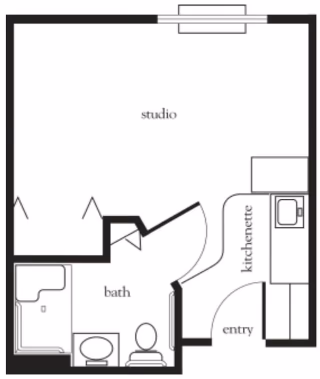 Floor plan of a studio apartment featuring an entryway leading to a kitchenette on the right side. The main studio living area is centrally located. A bathroom is situated in the lower left corner, equipped with a shower, toilet, and sink.