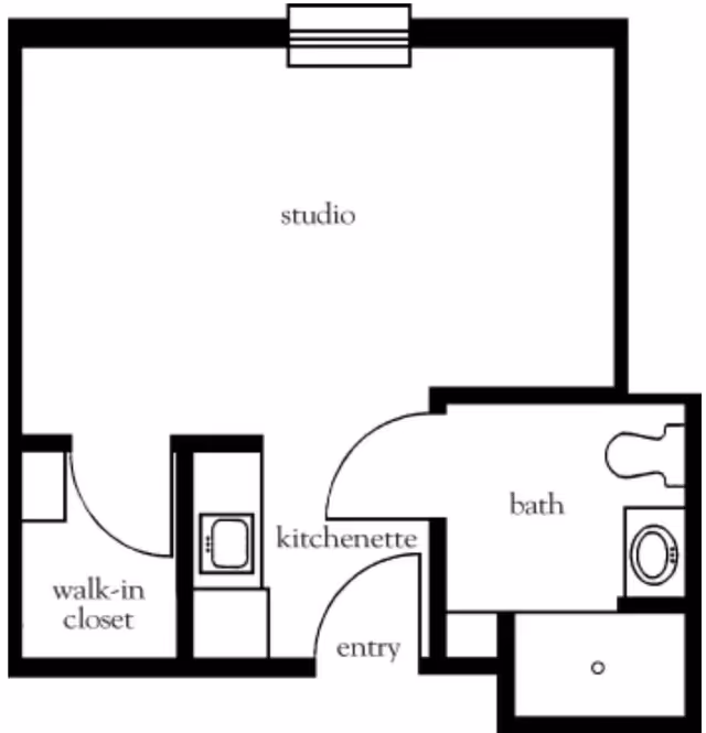 Floor plan of a studio apartment featuring a studio living area, a walk-in closet, a kitchenette near the entry, and a bathroom with a toilet and sink.