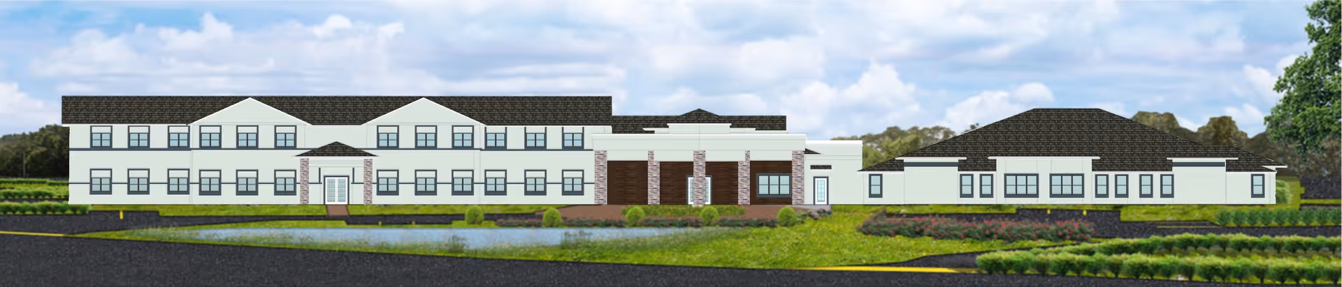 Exterior rendering of a wide two-story senior living building with landscaped grounds and a small pond in front.