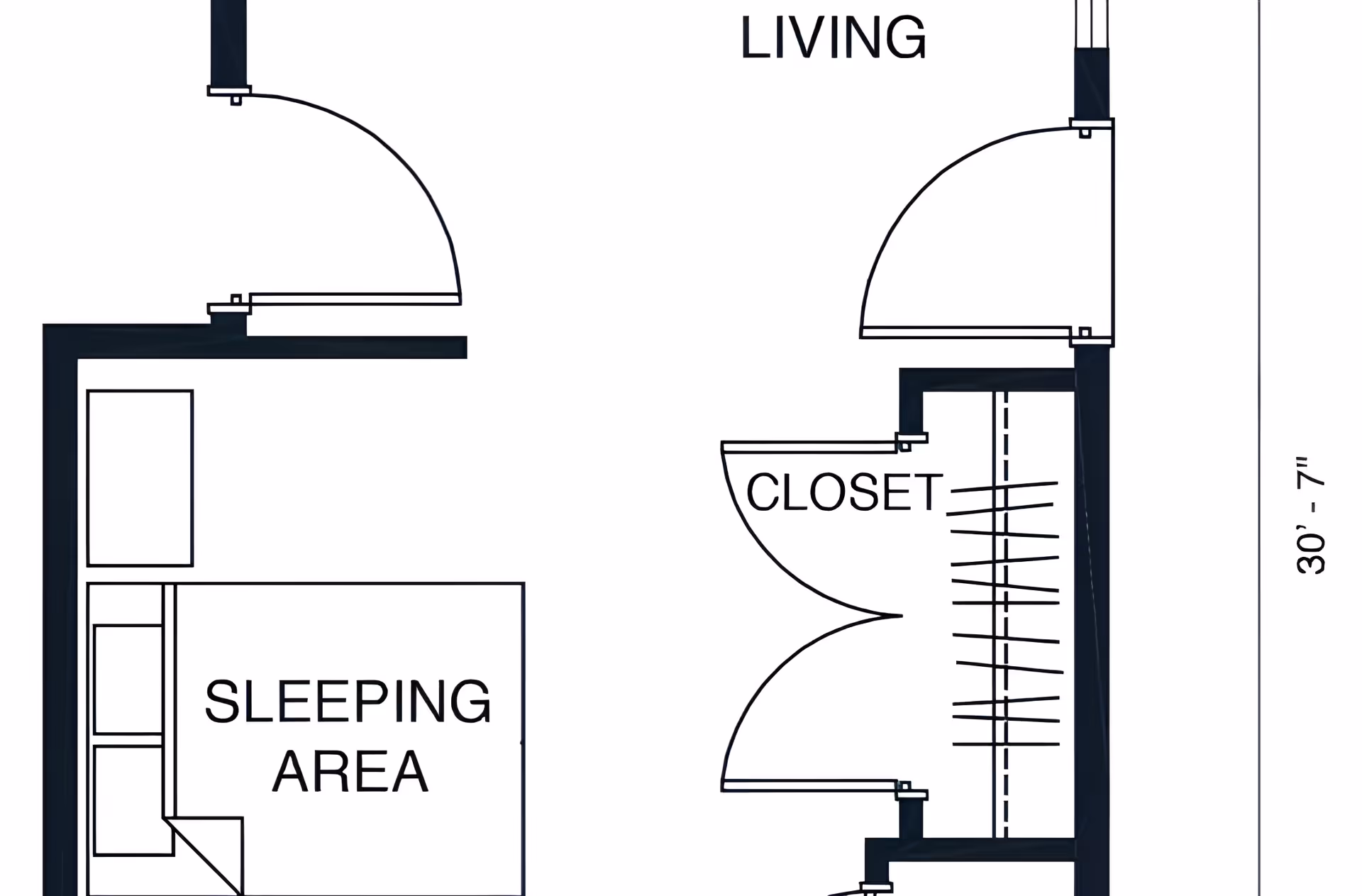 Architectural floor plan showing a layout with labeled areas including a sleeping area, closet, and living space with doors.