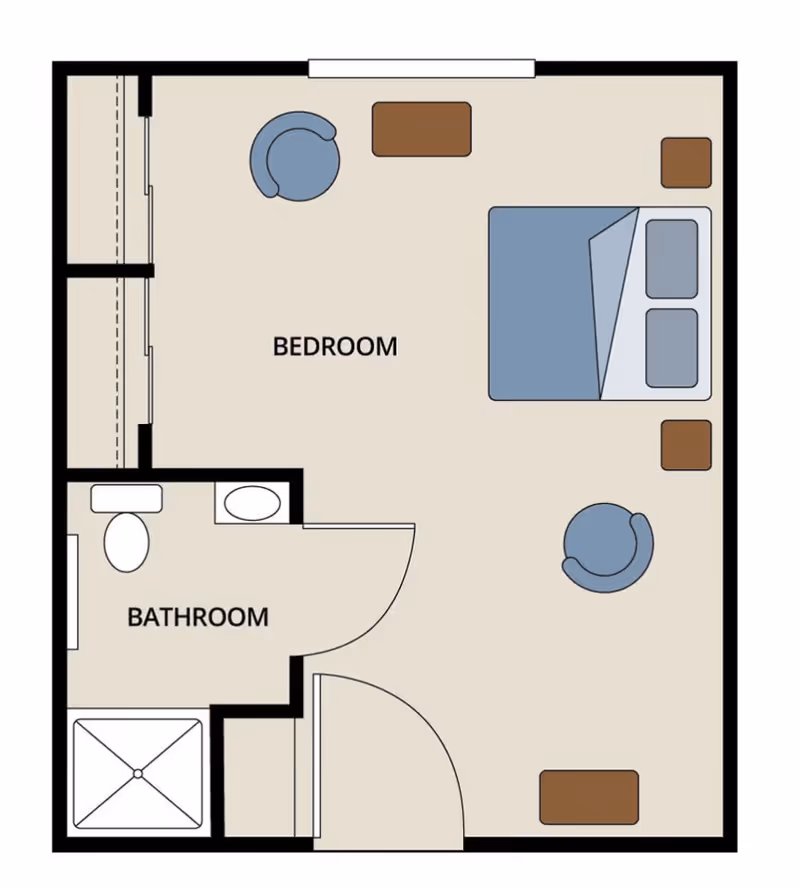Floor plan of a room at Briar Glen Alzheimer's Special Care Center showing a bedroom with a bed, two chairs, and several small tables. The bedroom connects to a bathroom with a toilet, sink, and shower.