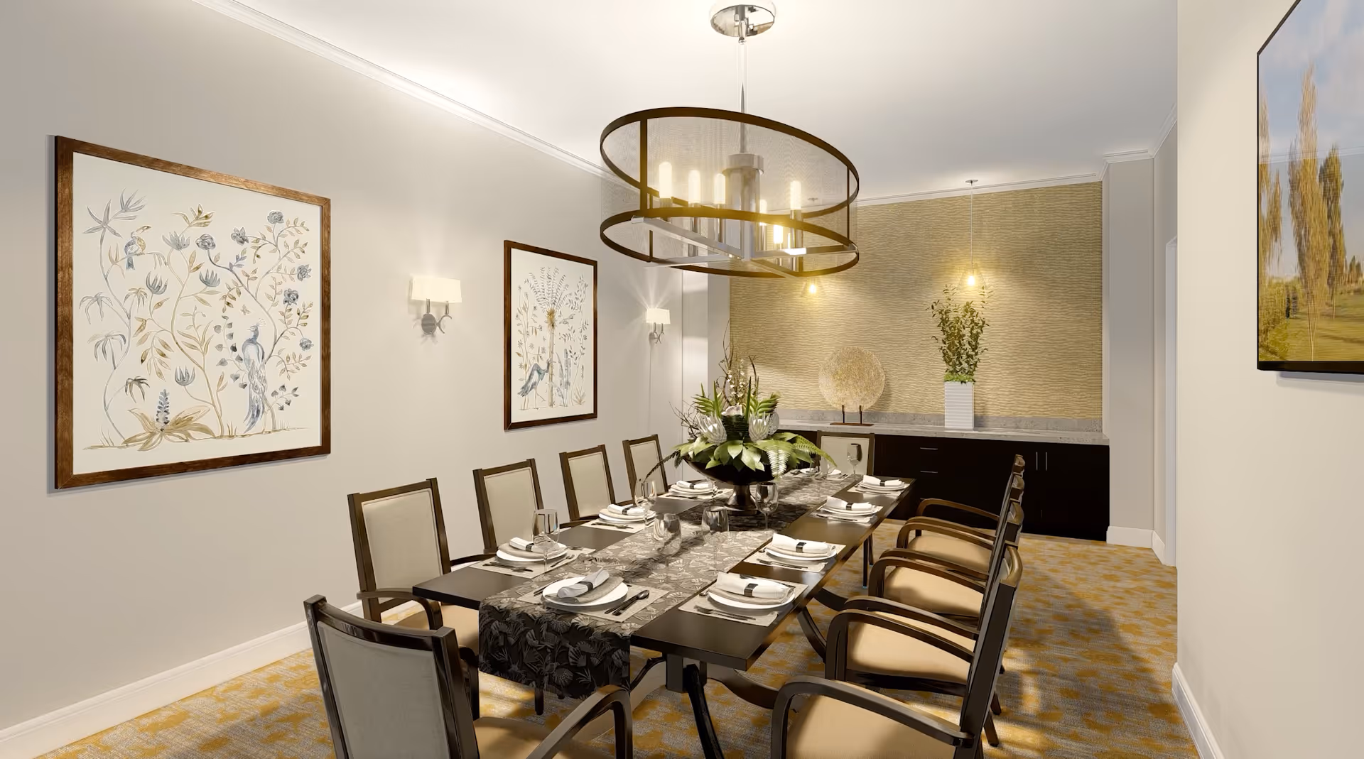 A well-lit dining room with a long rectangular table set for ten people. The table features a decorative runner, plates, napkins, glasses, and cutlery. There are cushioned chairs with wooden frames around the table. The walls are adorned with framed botanical artwork, and a modern chandelier hangs above the table. At the far end, there is a sideboard with decorative items including a vase with greenery and a large ornamental piece. The room has a warm and inviting atmosphere.