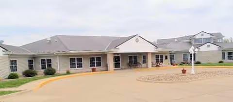 Front view of OakView Nursing and Rehabilitation exterior with entrance, driveway, and landscaping.