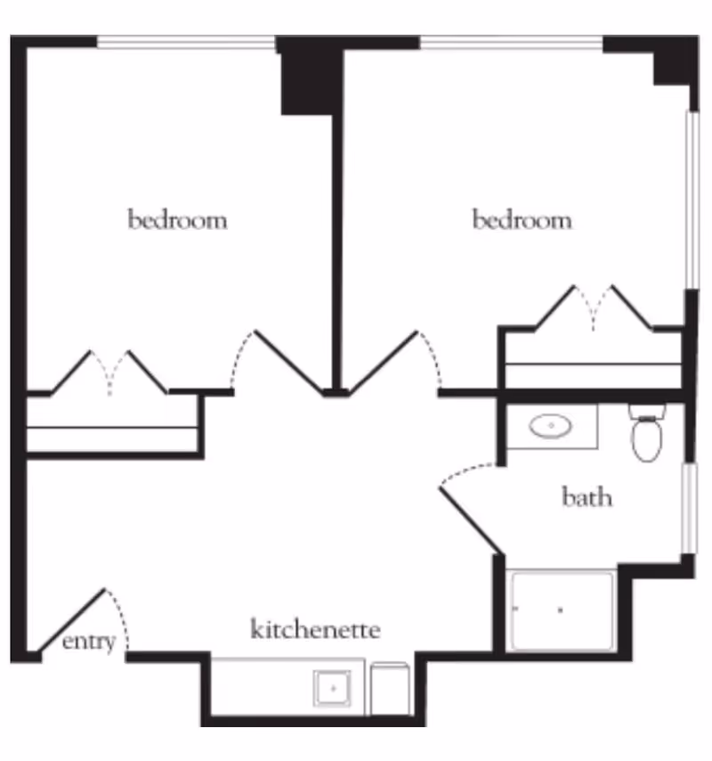 Floor plan layout showing two bedrooms, a kitchenette, a bathroom, and an entry area.