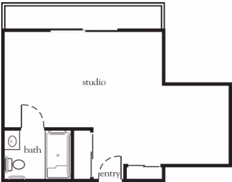 Floor plan layout of a studio apartment with an entry area, a combined studio living space, and a bathroom that includes a toilet, sink, and bathtub.