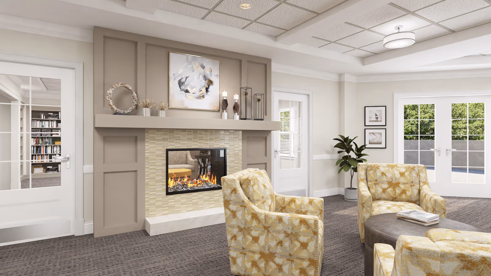 Bright communal living room with patterned armchairs arranged around a gas fireplace and glass doors to the outside.