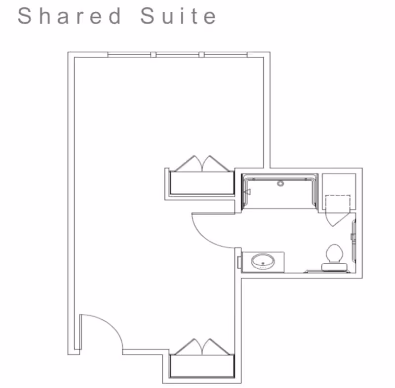 Architectural floor plan of a shared suite showing a main living/sleeping area with two closets and an attached bathroom with a sink, toilet, and shower.