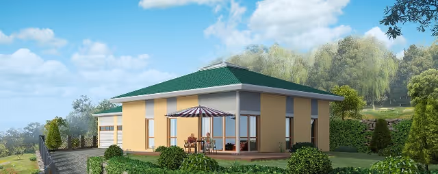 Single-story assisted living facility building with a green roof and beige walls, featuring a patio with an umbrella and outdoor seating. The building is surrounded by greenery, bushes, trees, and a clear blue sky with some clouds.