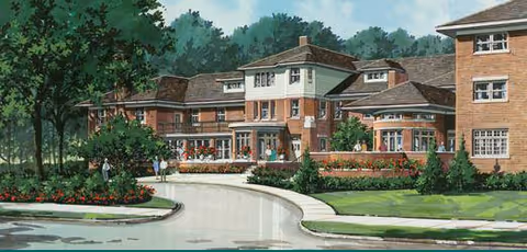 Illustration of the front exterior of a large residential building with multiple sections, surrounded by trees, bushes, and flower beds, with a curved driveway leading to the entrance.