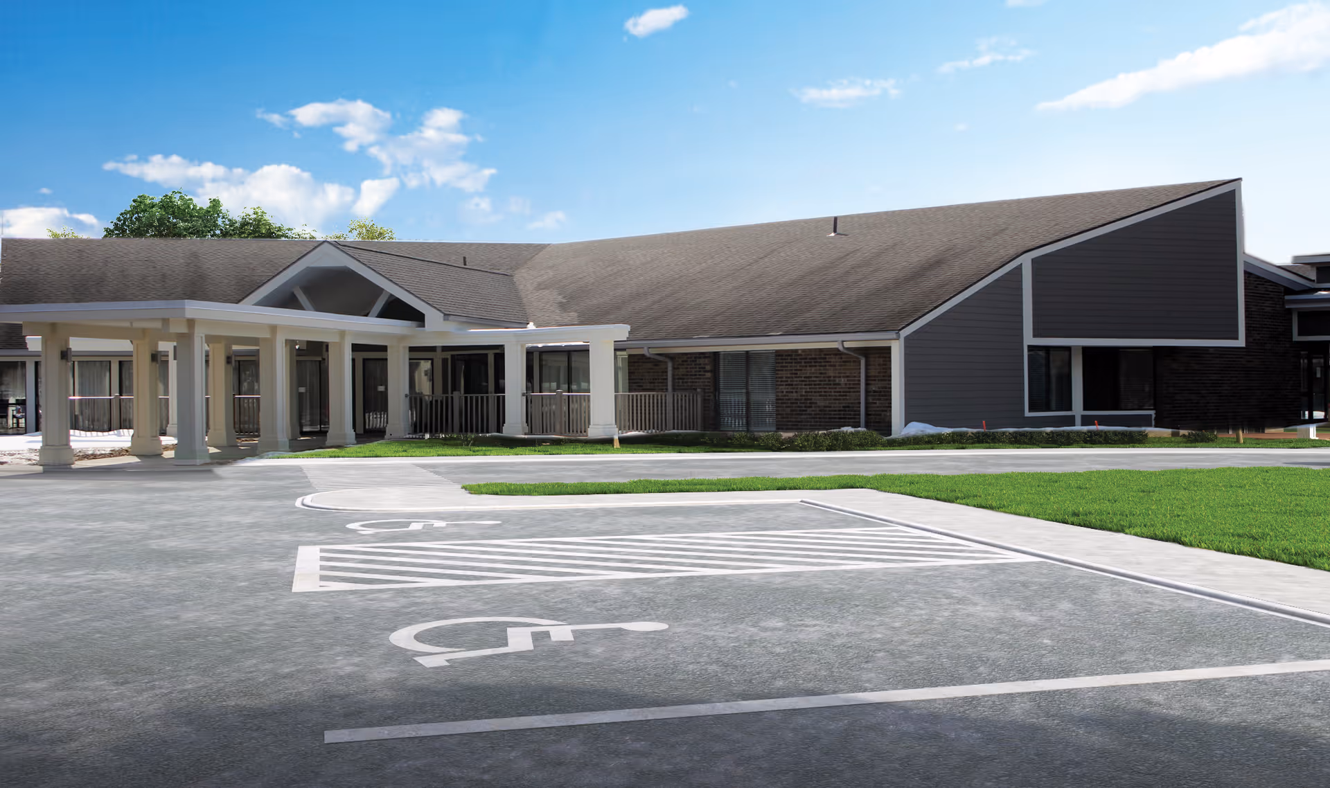 Front exterior of Fairview Manor with a covered entryway, accessible parking spaces, and a lawn.