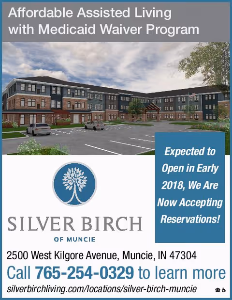 Promotional image for Silver Birch of Muncie showing a large three-story assisted living building with parking spaces in front under a cloudy sky. Text highlights affordable assisted living with Medicaid Waiver Program and announces the facility is expected to open in early 2018 and is now accepting reservations. Contact phone number and website are provided.