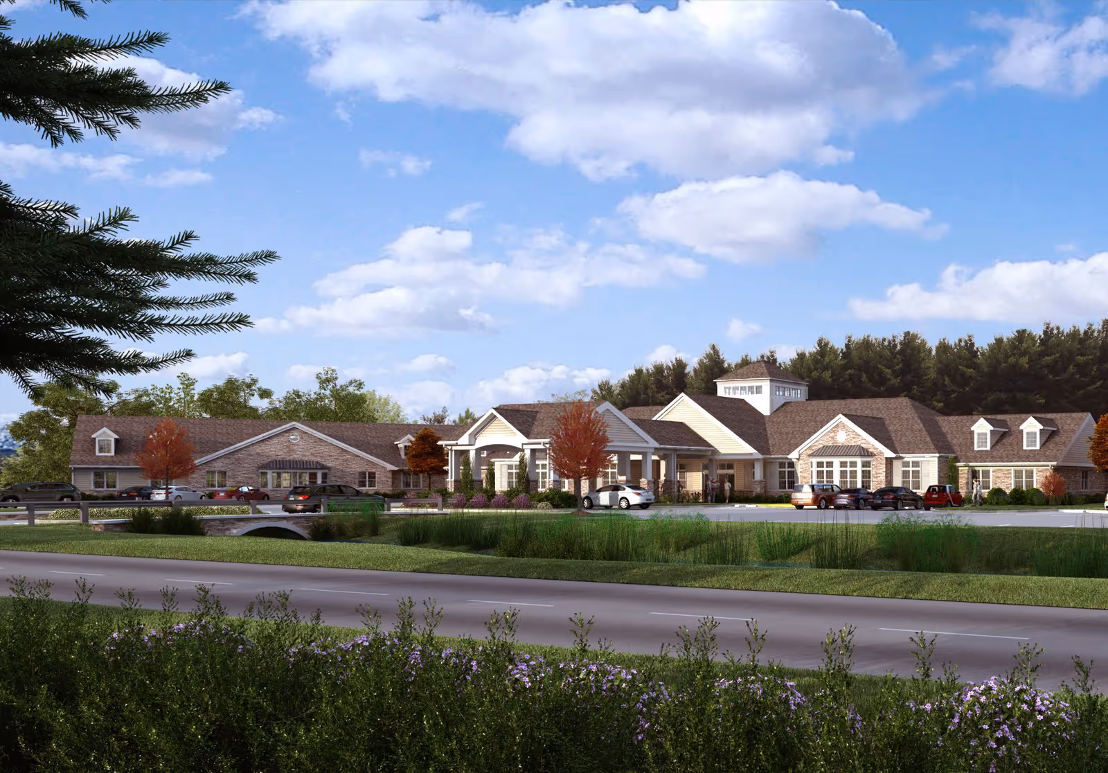Exterior view of Mapleview Country Villa with parked cars and landscaped grounds.