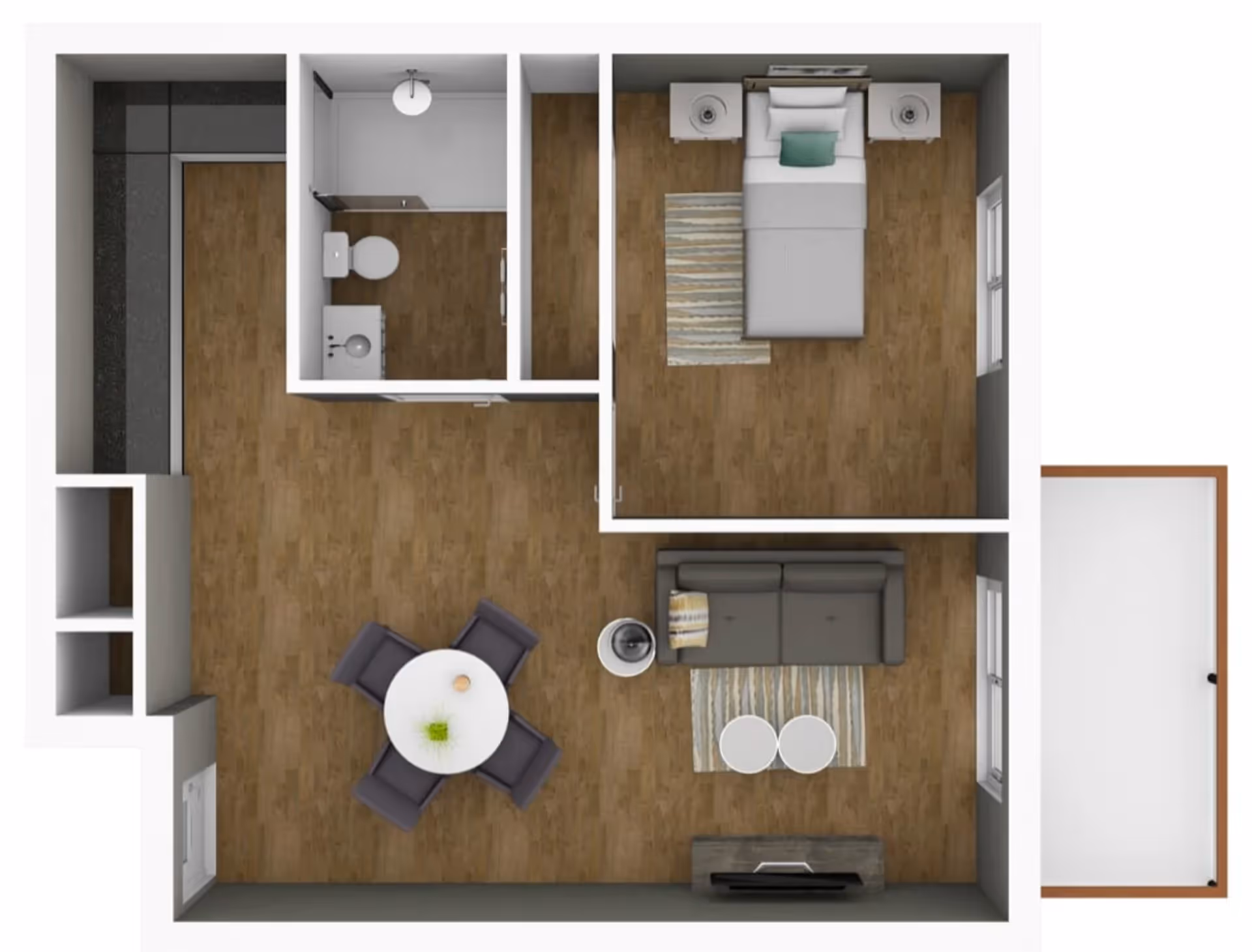 Top-down floor plan of an assisted living apartment showing a bedroom with a bed and two nightstands, a bathroom with a toilet and sink, a living room with a sofa, two round coffee tables, a TV stand with a TV, and a dining area with a round table and four chairs. The apartment has wood flooring throughout and a small balcony or patio area.