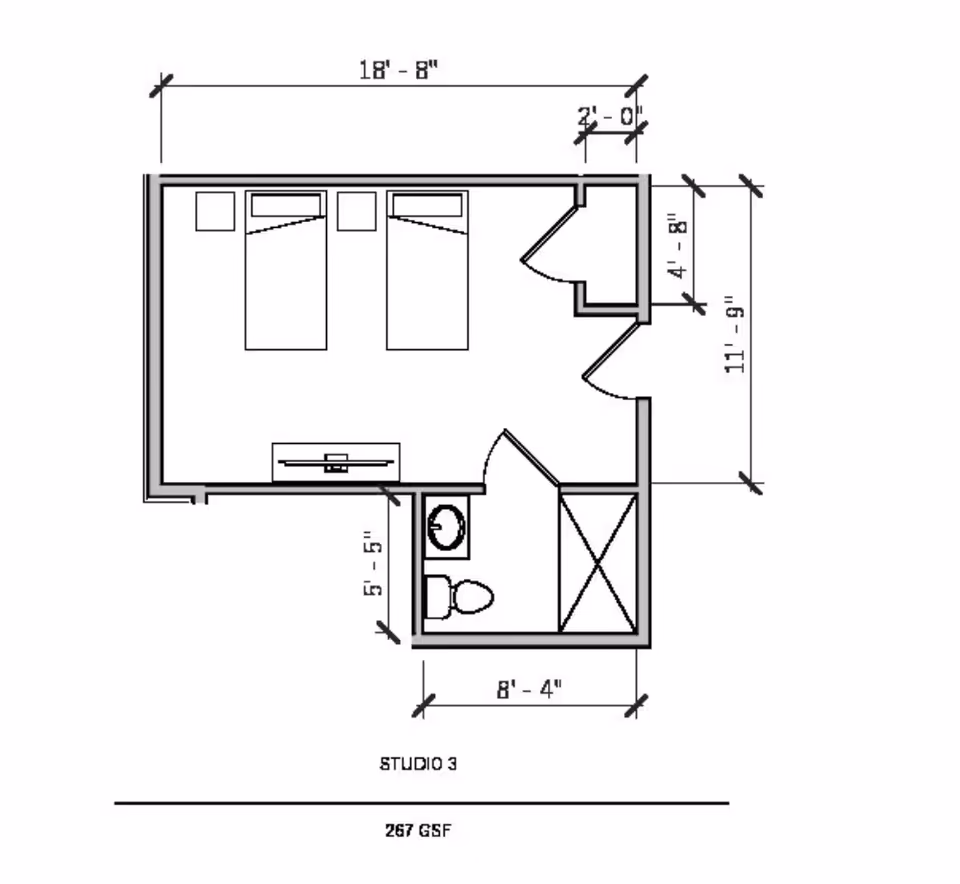 Architectural floor plan of a studio apartment labeled Studio 3 with dimensions. The layout includes two beds, a small closet, a bathroom with a toilet and sink, and a shower area. The total area is 267 GSF.