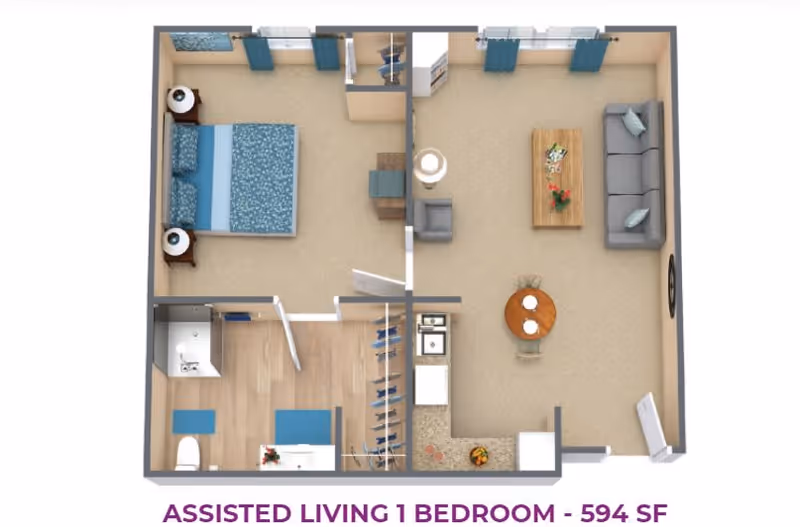 3D floor plan of a one-bedroom assisted living apartment showing a bedroom with a bed and two nightstands, a bathroom with a toilet and sink, a kitchen with appliances and counter space, a dining area with a round table and two chairs, and a living room with a sofa, armchair, coffee table, and side table.