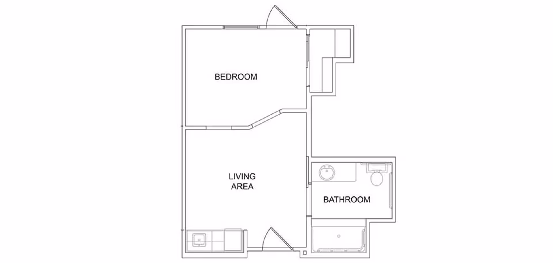 Black-and-white floor plan of a one-bedroom apartment showing a bedroom, living area, and bathroom.