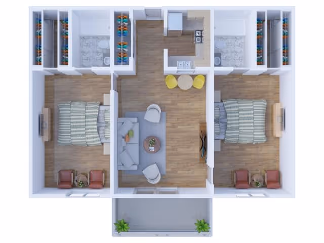 Top-down view of a two-bedroom apartment floor plan featuring two bedrooms each with a bed, two chairs, and closets. The central living area includes a sofa, two chairs, a coffee table, and a TV. The kitchen area has a small dining table with two chairs. There are two bathrooms adjacent to the bedrooms. A balcony with two plants is visible at the bottom.