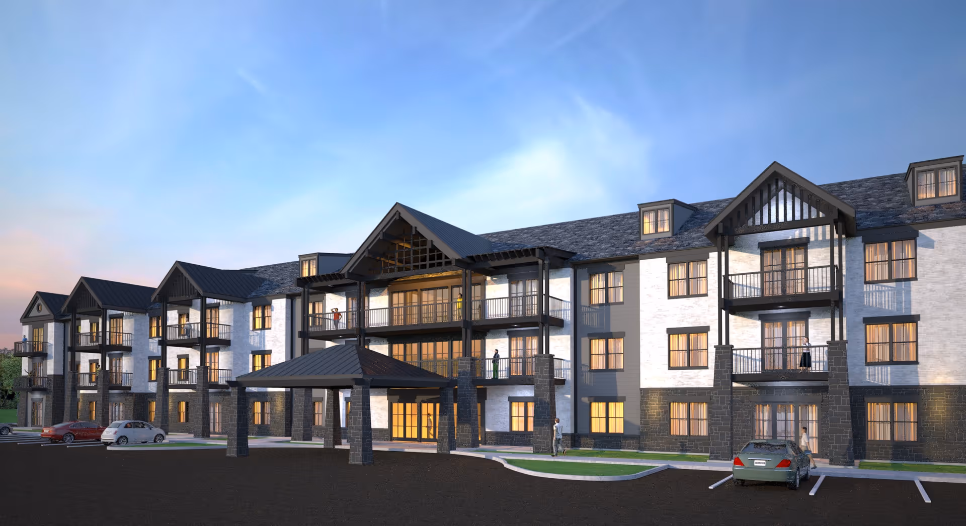 Exterior view of a three-story senior living facility building named Beau Ridge at Oxford Farms during dusk, showing multiple balconies, large windows with warm interior lighting, a covered entrance, and a few parked cars in front.