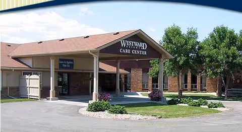 Front view of Westward Heights Care Center entrance with covered walkway and surrounding landscaping.