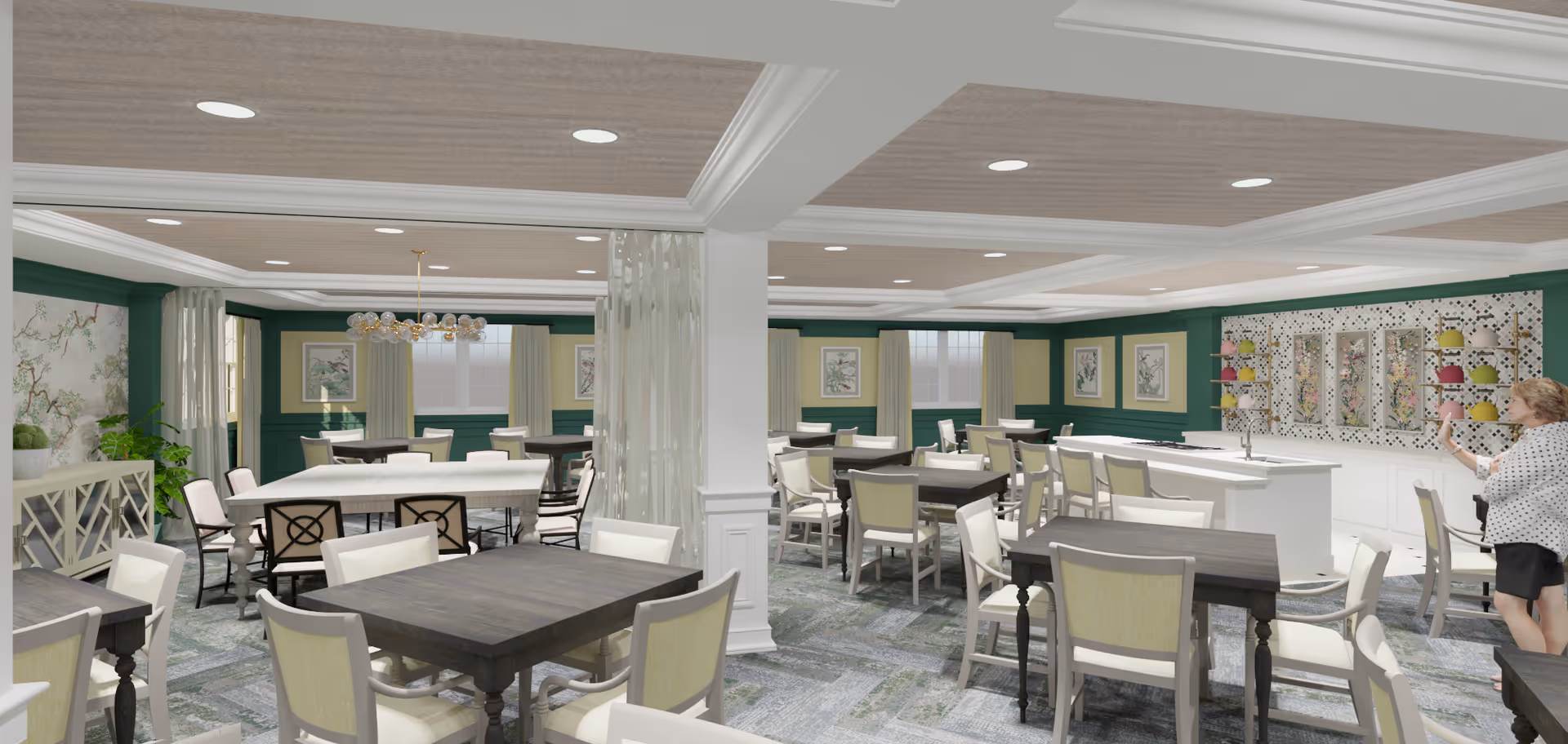 Large, well-lit dining room with multiple tables and chairs, green-accented walls, a buffet counter, and a person near the right edge.